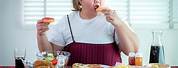 Obese Woman Eating Food