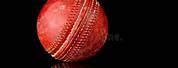 Red Cricket Ball with Black Background