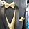 Black Suit with Gold Bow Tie
