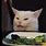 Confused Cat at Table