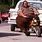 Fat Man On Mini Bike