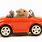 Hamster Driving a Toy Car