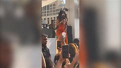 Someone in the crowd threw a drink at Cardi B. See how she reacted