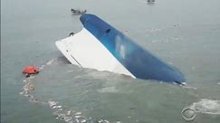 Divers begin to pull bodies from sunken S. Korean ferry as death toll rises