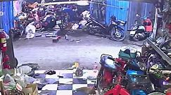 Motorcycle catches fire sparking panic among shop staff