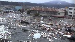 Tsunami in Kesennuma city, ascending the Okawa river