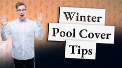 Should a winter pool cover touch water?