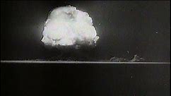 CIRCA 1940s - Atomic bomb test footage, including great footage of the dreaded mushroom cloud, as well as a look at the town of Oak Ridge, Tennessee, which was established as a production site