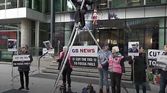 XR demonstrators throw fake oil in GB News protest