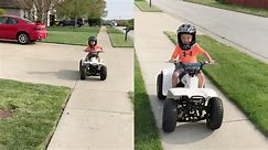 Excited kiddo shows no hesitation before attacking dad with his mini four-wheeler