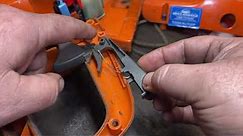 Husqvarna 455 chainsaw throttle trigger and lock out lever repair.