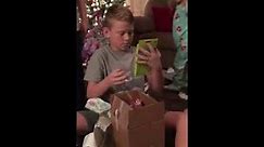 Kid Gets First Cell Phone for Christmas - 986745