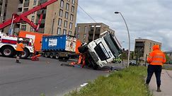 Lorry overturns on busy London road - 'travelling at just five miles an hour'