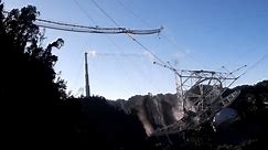 Drone video captures moment Arecibo telescope collapses