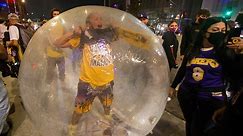 Lakers fan celebrates NBA title in own weird bubble
