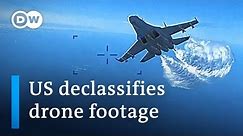 US releases video showing Russian aircraft intercepting US spy drone | DW News