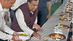 Mukesh Ambani serving food at his son’s pre wedding function..