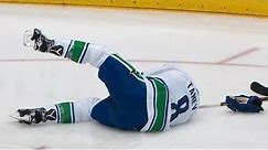 Tanev drops after Marner deflects puck straight to his face