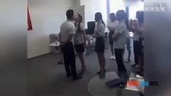 Women employees line up to kiss their boss in China