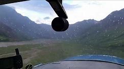 Cessna 150/150 STOL bush plane slow flight, arrival landing at bush Alaska strip, Texas taildragger