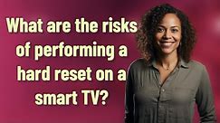 What are the risks of performing a hard reset on a smart TV?