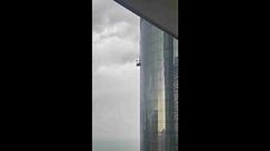 Terrifying storm swings construction worker into skyscraper in Dubai, UAE