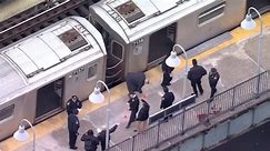Aerial video shows detectives comb subway site after Bronx shooting