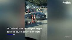 Tesla gets stuck in wet concrete