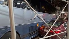 Bus Plows Through Parked Car