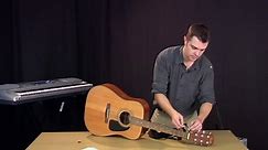Music Lessons How to Put on a Guitar Strap