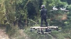 Incredible sight: Adventurer soars above river on DIY human drone