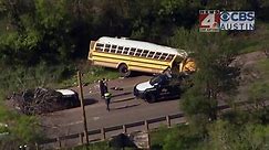 Truck going wrong way hits school bus in deadly collision