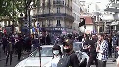 French police fire tear gas at crowds protesting Covid health passport rules