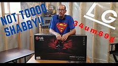 lg 34UM69G UNBOXING AND WALL MOUNTING HOW TO.