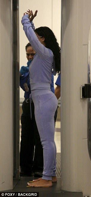 rihanna goes through airport checkpoint as she leaves la daily mail online