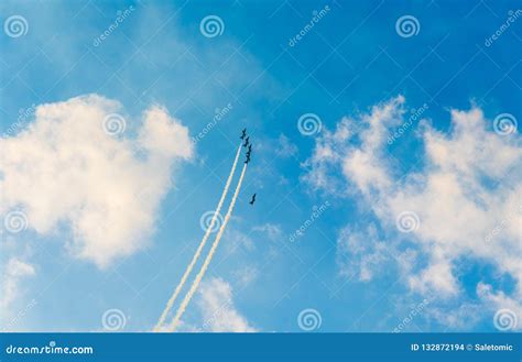 jet planes making shapes   sky stock photo image  airplane vacation
