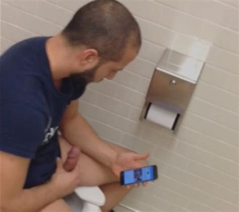 jerking his huge dick in a public toilet spycamfromguys hidden cams spying on men