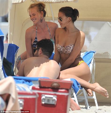 how cheeky irina shayk and anne v show off their flirty side and bikini clad bottoms in
