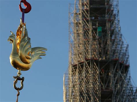 notre dame cathedral spire  golden rooster weathervane winnipeg sun