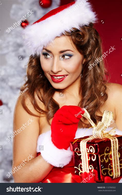 Portrait Of Beautiful Sexy Girl Wearing Santa Claus