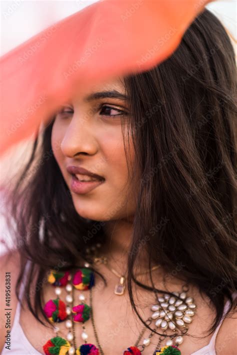 portrait of beautiful indian girl wearing indian traditional dress