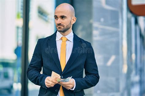 young hispanic bald businessman   expression counting