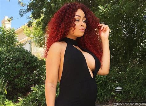 pregnant blac chyna shows off major cleavage and red curly