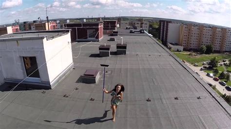 drone discovers  woman  topless   roof youtube