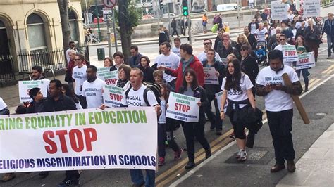 hundreds protest over ‘religious discrimination in schools