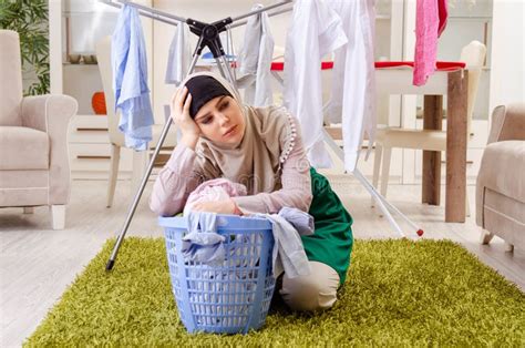 woman in hijab doing clothing ironing at home stock image image of