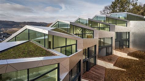 sleek multi family housing complex unfolds  luxembourg curbed