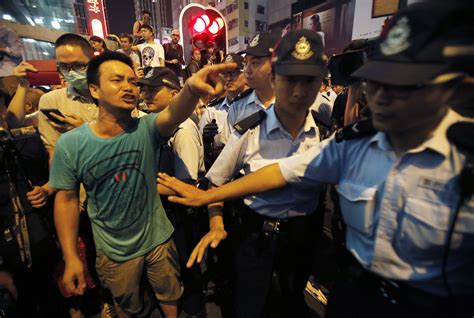 violence erupts  hong kong  protesters  assaulted   york times