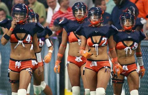 lingerie football teams of scantily clad ladies take to the field for