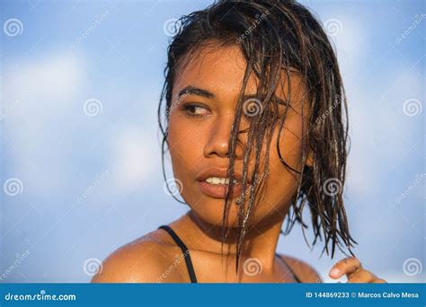 Young Beautiful And Sexy Asian Girl In Bikini With Wet Hair Enjoying